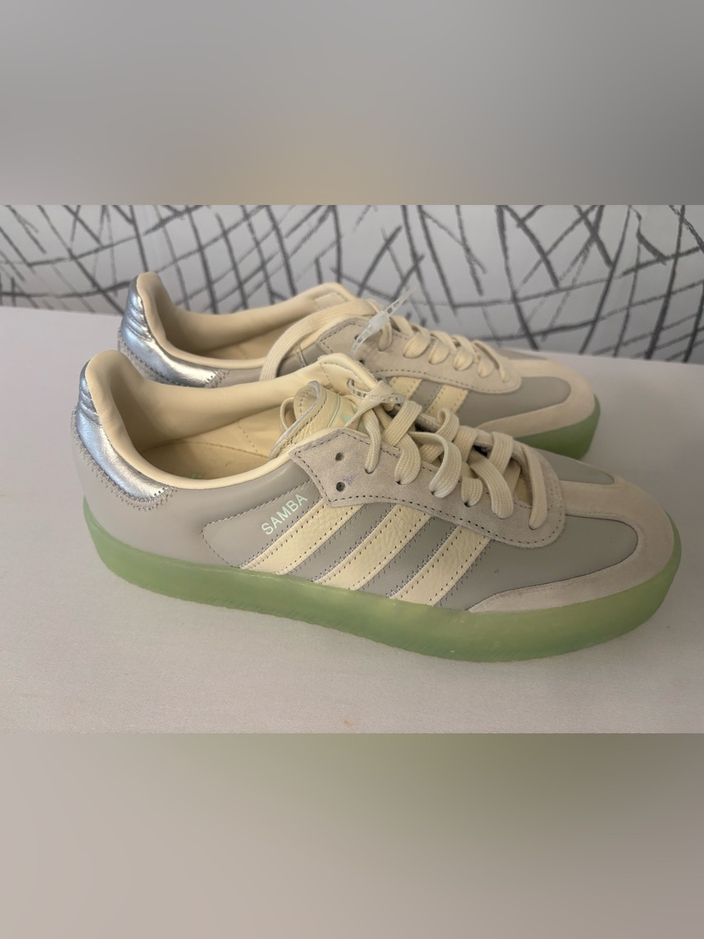 Adidas Samba shoes in the "Grey One/Crew White/Clear Mint"